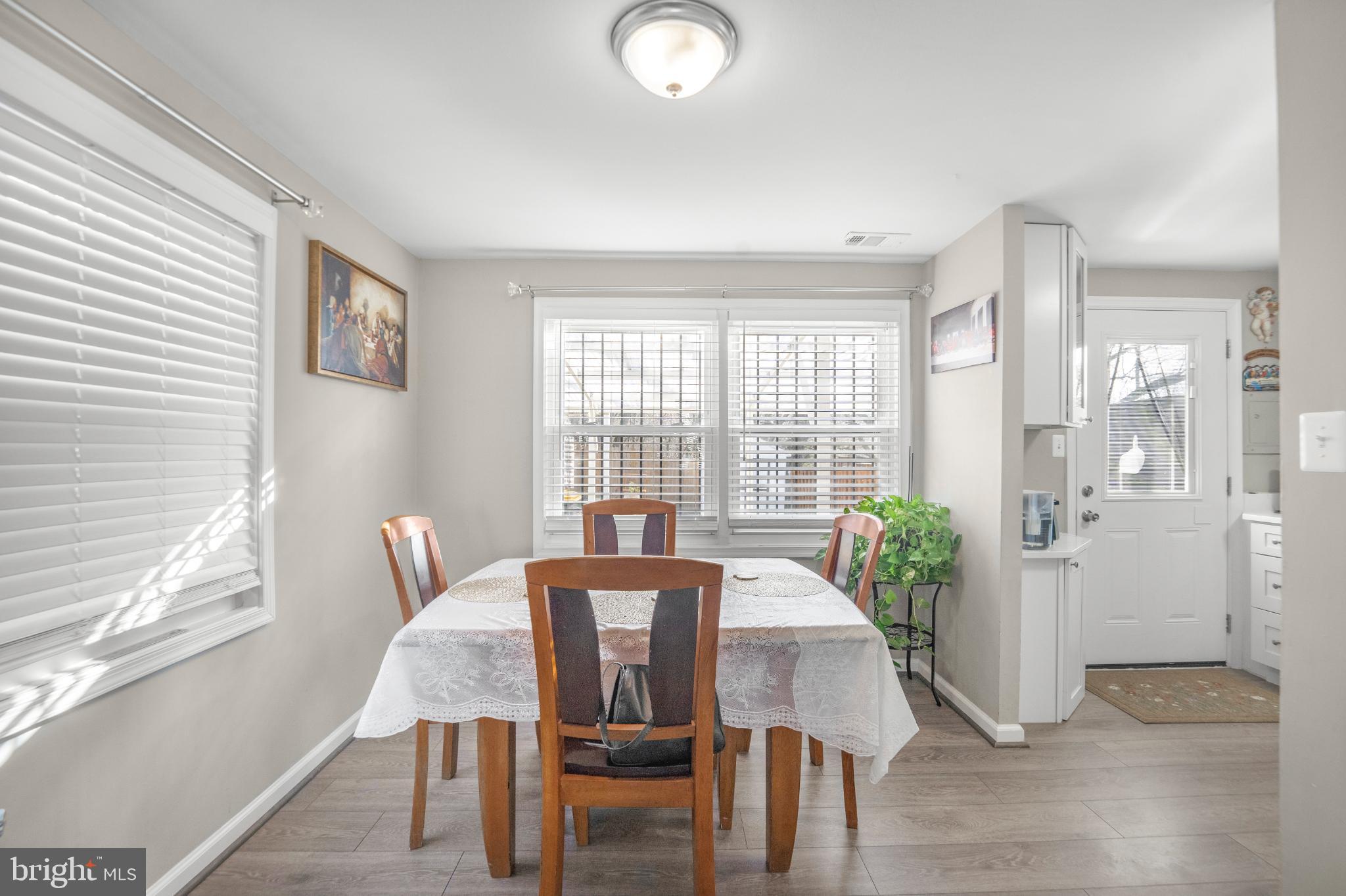 7617 Allendale Circle Landover, MD 20785 - Photo 8 of 26 a view of a dining room with furniture window and wooden floor