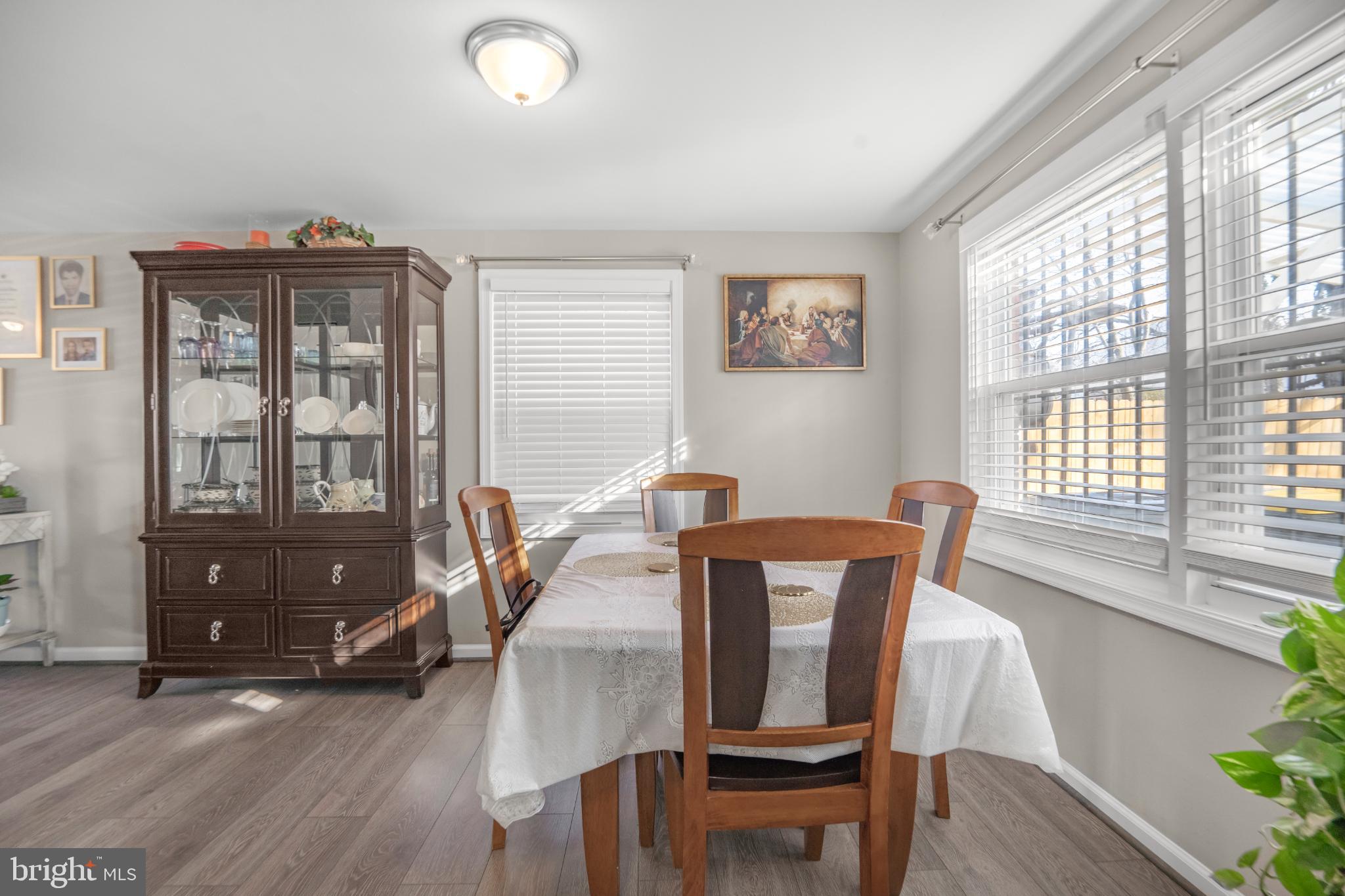 7617 Allendale Circle Landover, MD 20785 - Photo 10 of 26 a view of a dining room with furniture window and wooden floor