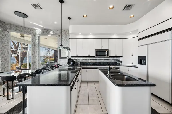 a outdoor space with patio the couches and a dining table with the view of garden
