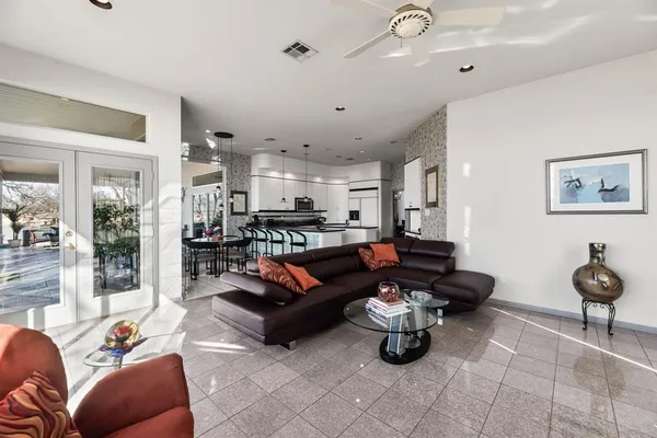 a bathroom with a double vanity sink and a mirror