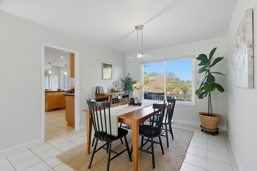 11868 Bloomington Way Dublin, CA 94568 - Photo 12 of 59 a view of a dining room with furniture window and wooden floor