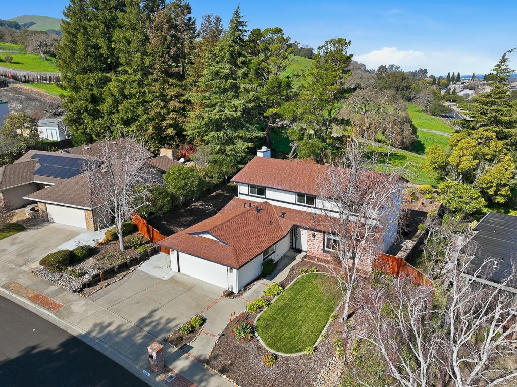 11868 Bloomington Way Dublin, CA 94568 - Photo 3 of 59 an aerial view of a house with swimming pool and garden