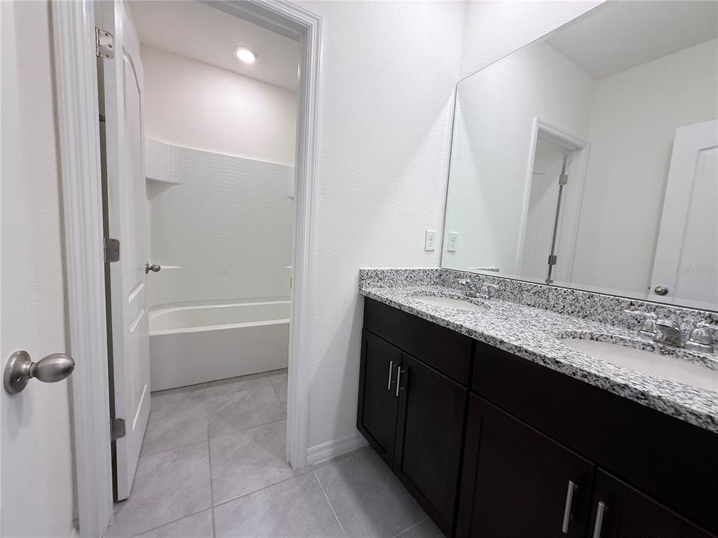 7809 Oak Reflection Loop Davenport, FL 33837 - Photo 23 of 43