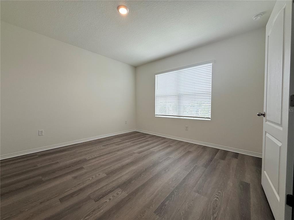 7809 Oak Reflection Loop Davenport, FL 33837 - Photo 8 of 43
