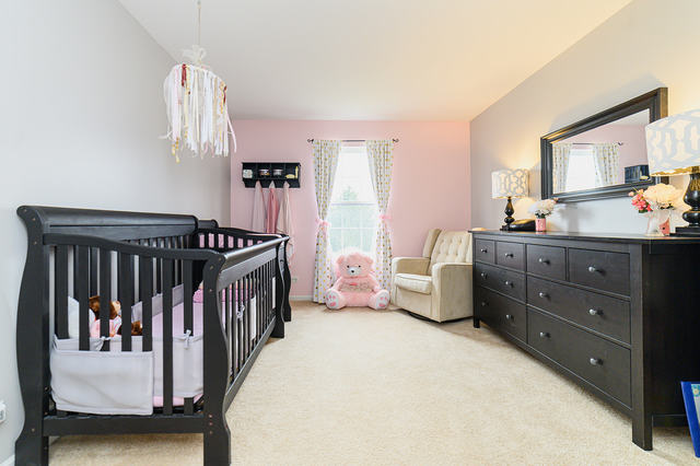 604 Springbrook Trail North Oswego, IL 60543 - Photo 17 of 22 a bedroom with furniture and a window