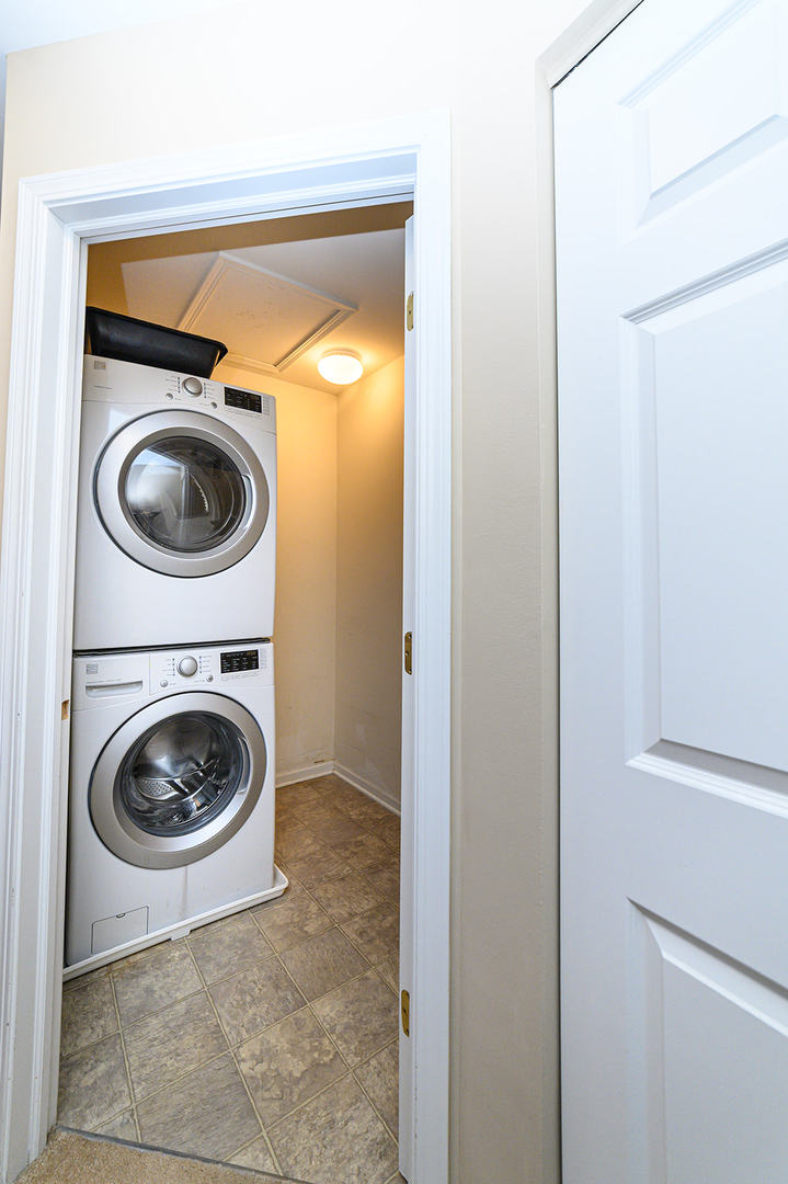 604 Springbrook Trail North Oswego, IL 60543 - Photo 19 of 22 a utility room with dryer and washer