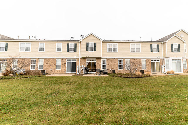 604 Springbrook Trail North Oswego, IL 60543 - Photo 20 of 22 a view of a yard in front of the house