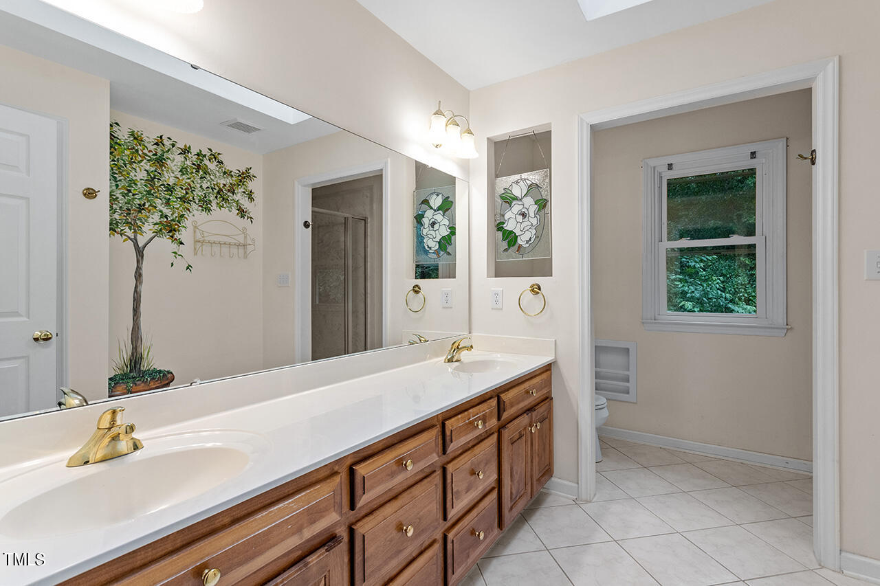 1925 Hamrick Drive Raleigh, NC 27615 - Photo 22 of 38 Primary Bath