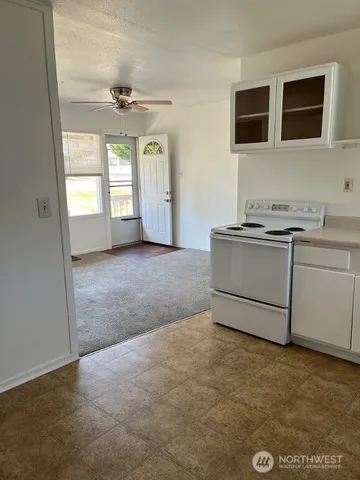 a white refrigerator freezer sitting in a kitchen