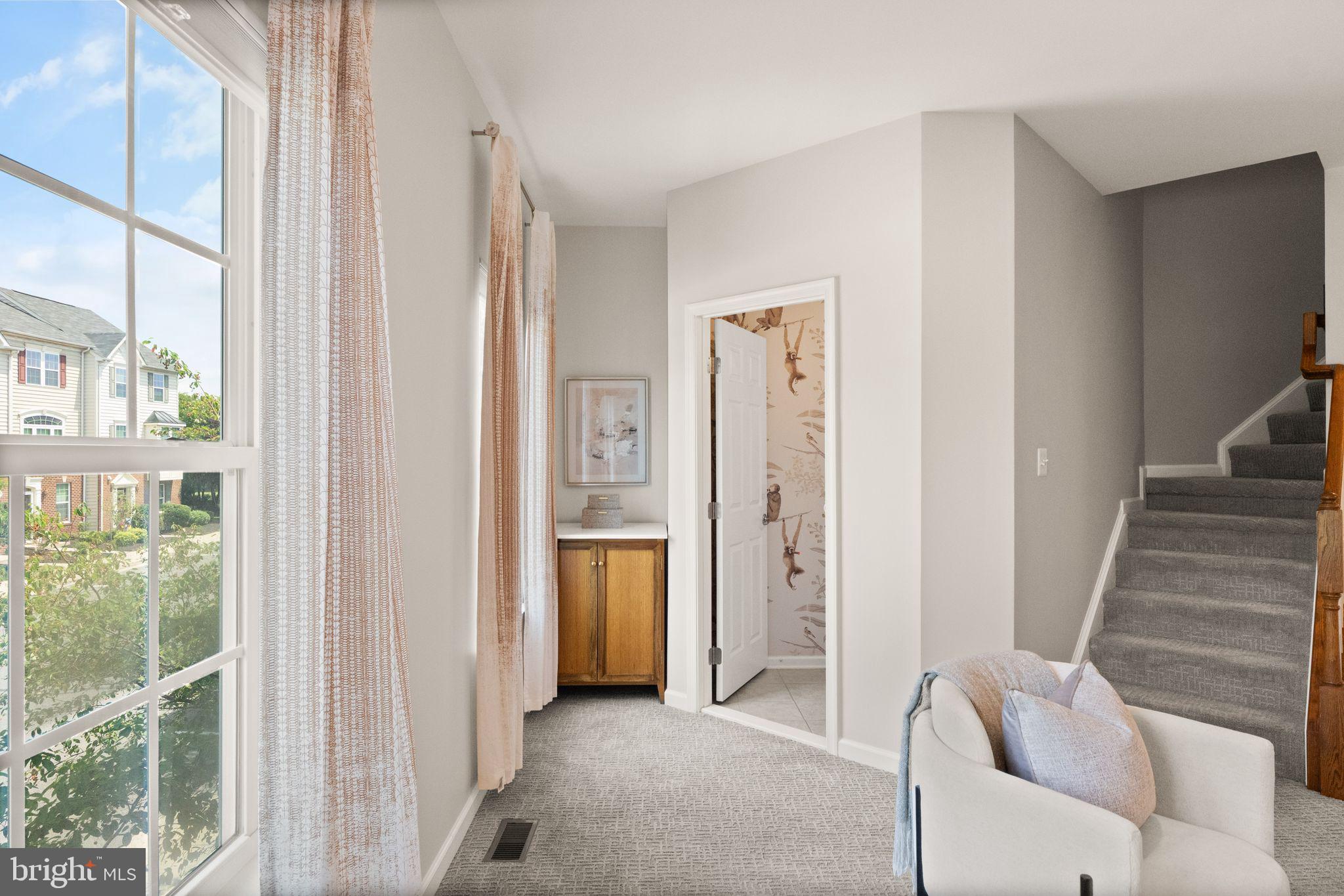 7015 Trek Way Gainesville, VA 20155 - Photo 16 of 56 Storage nook outside of powder room