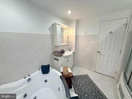 a bathroom with a sink and a tub
