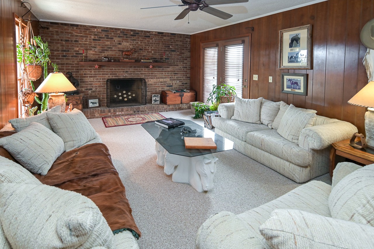 429 Hicks Cut Road Pulaski, TN 38478 - Photo 19 of 70 a living room with furniture and a fireplace