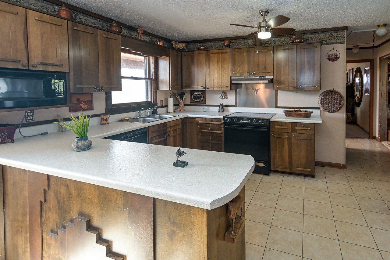 429 Hicks Cut Road Pulaski, TN 38478 - Photo 27 of 70 a kitchen with a sink a stove and cabinets