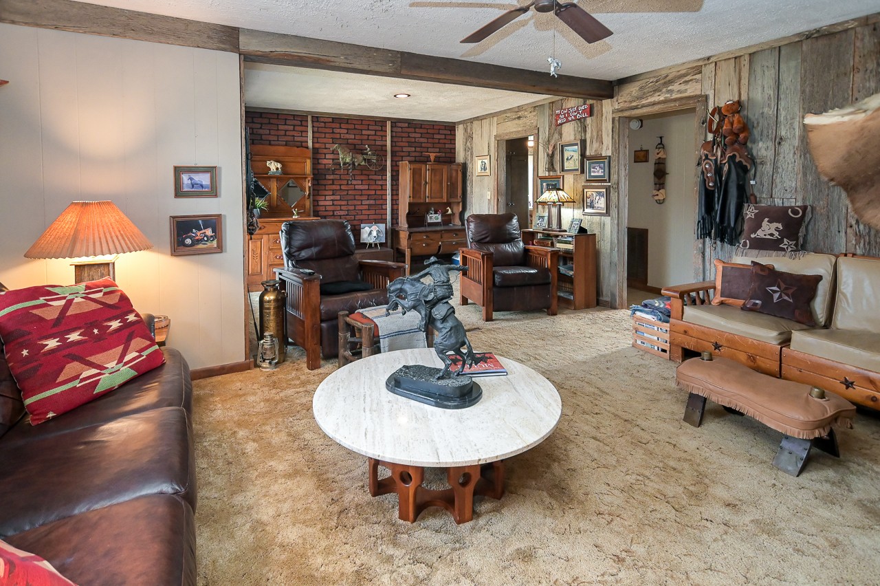 429 Hicks Cut Road Pulaski, TN 38478 - Photo 31 of 70 a room with furniture and a chandelier