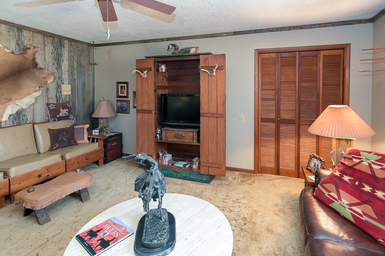 429 Hicks Cut Road Pulaski, TN 38478 - Photo 32 of 70 a living room with furniture and a flat screen tv