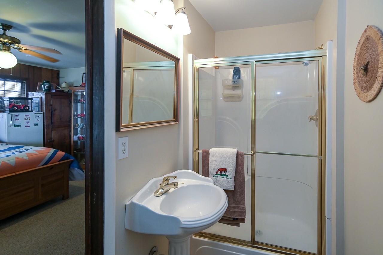 429 Hicks Cut Road Pulaski, TN 38478 - Photo 51 of 70 a bathroom with a sink toilet and shower