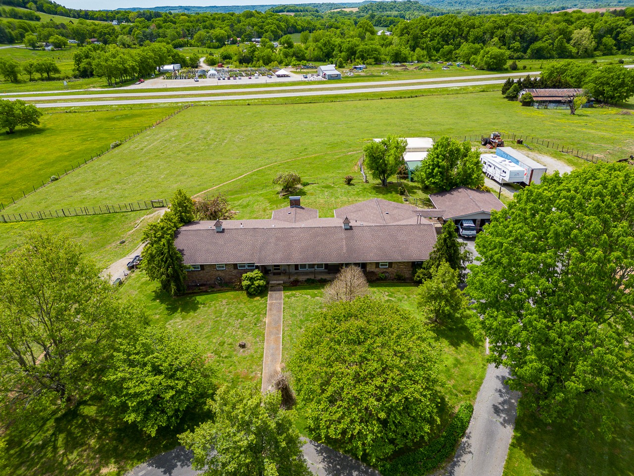 429 Hicks Cut Road Pulaski, TN 38478 - Photo 8 of 70 a view of a lake with a yard and outdoor seating