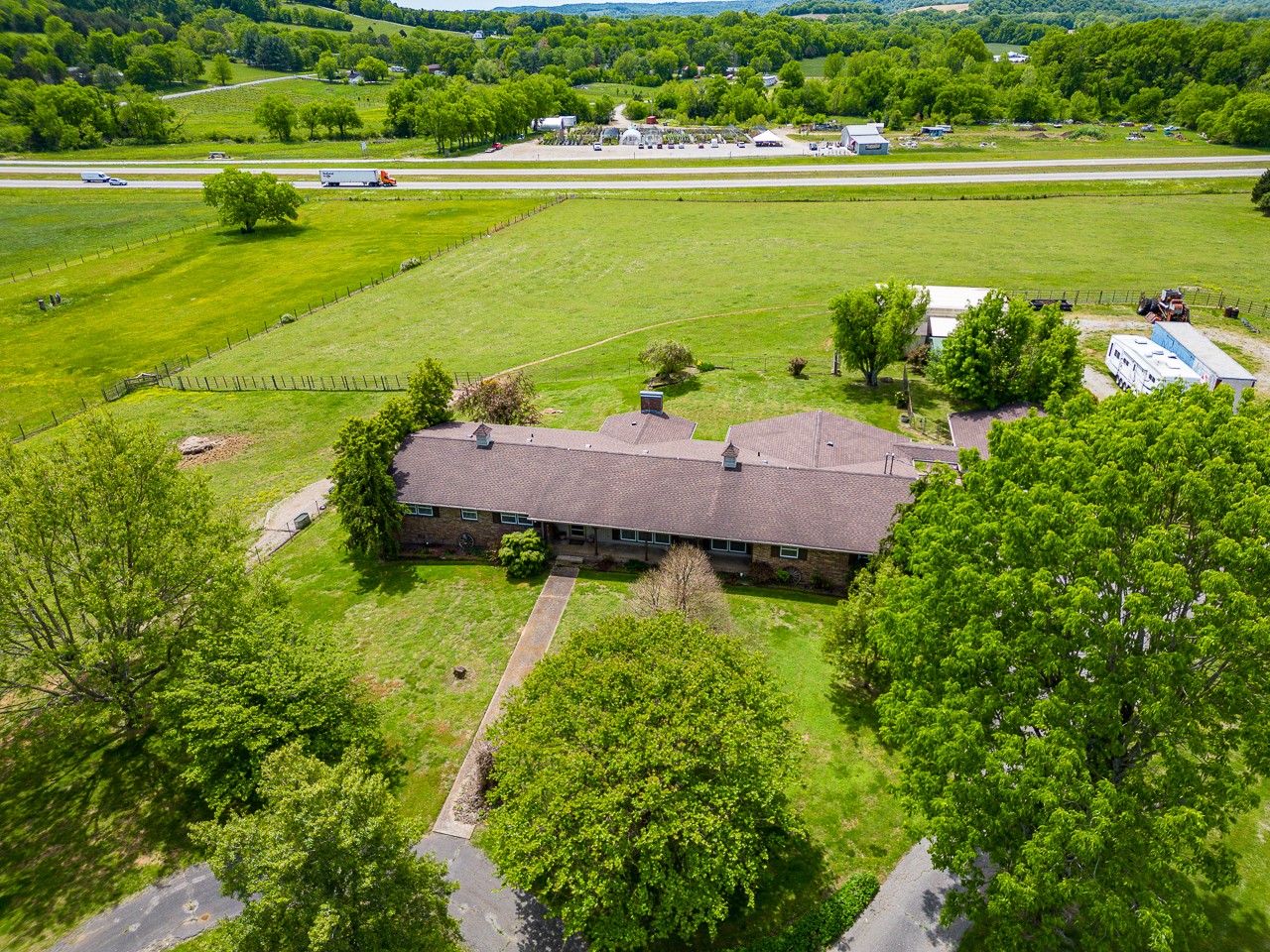 429 Hicks Cut Road Pulaski, TN 38478 - Photo 9 of 70 an aerial view of a house with a yard and lake view