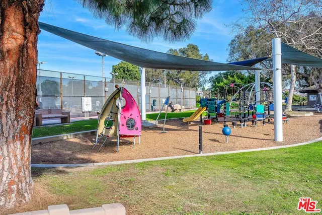 a view of park with sitting area