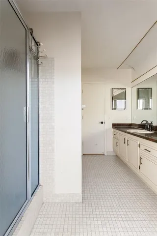 a view of a walk in closet and bedroom