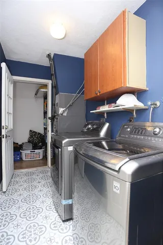 a kitchen with stainless steel appliances granite countertop a sink and a stove