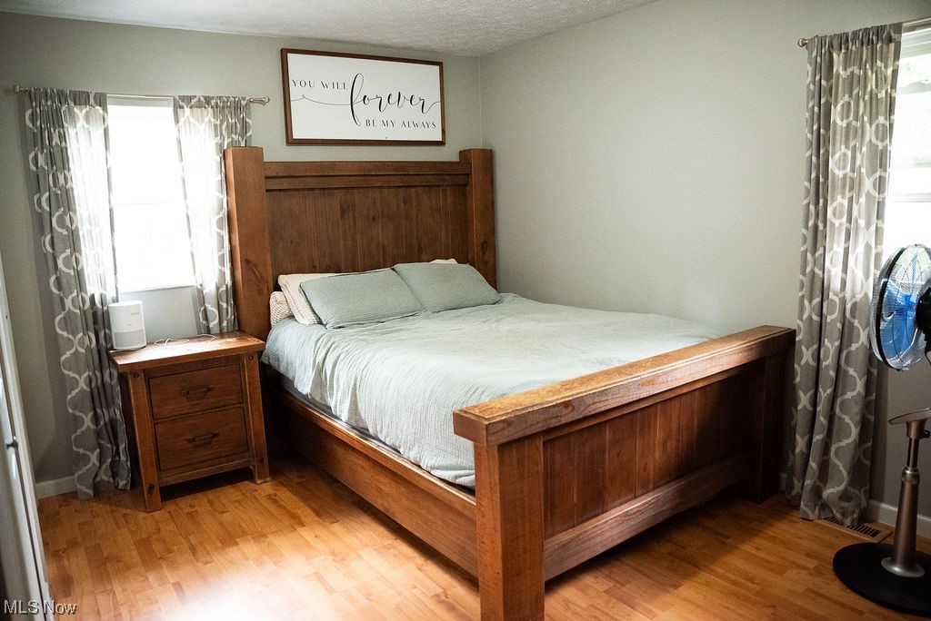 1906 Aberdeen Road Madison, OH 44057 - Photo 12 of 16 Bedroom featuring new flooring