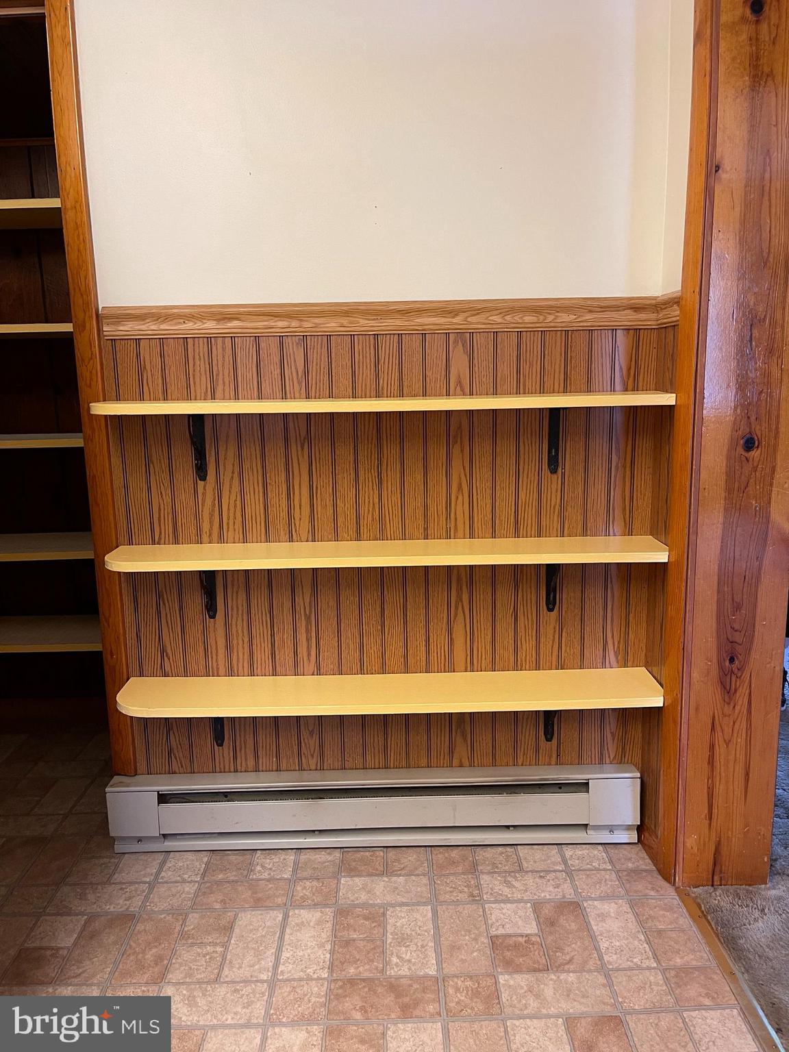 4901 Brookwood Road Baltimore, MD 21225 - Photo 13 of 39 Extra shelves on kitchen wall