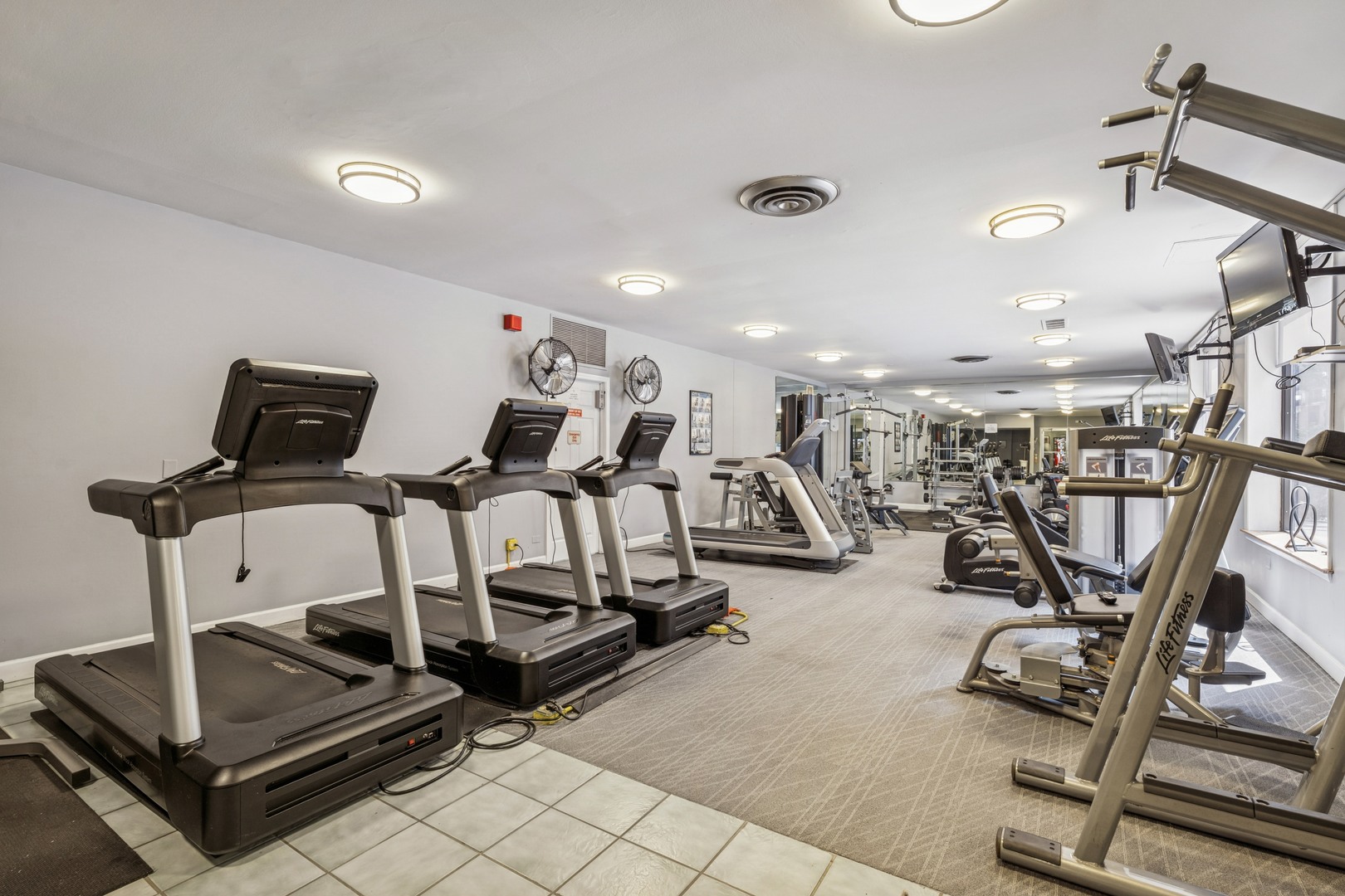 Undisclosed Address Chicago, IL 60613 - Photo 13 of 15 a view of a room with gym equipment