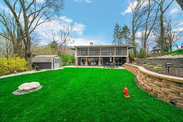 a view of a house with a garden