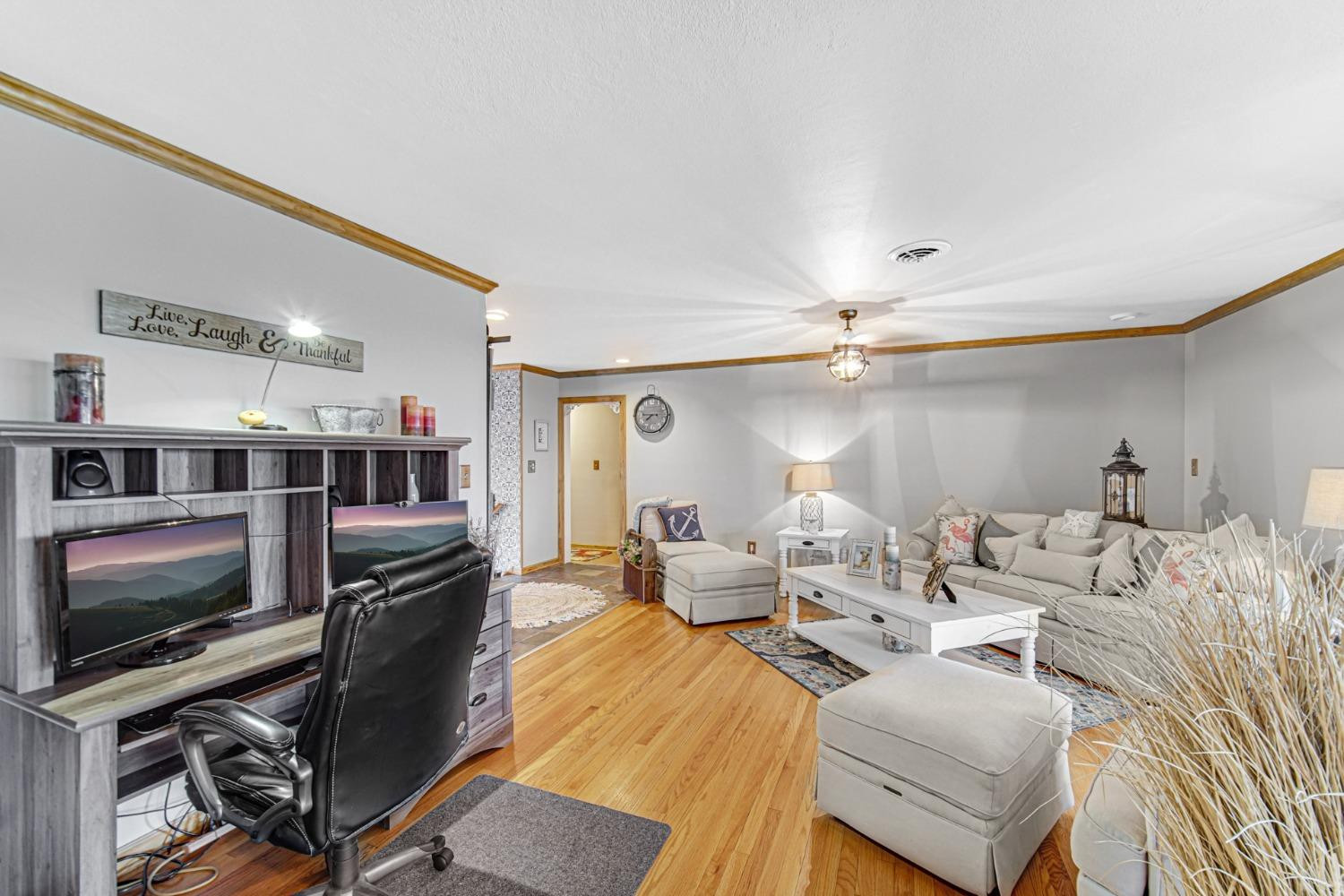 42 Ogden Road Portage, IN 46368 - Photo 14 of 40 a living room with furniture and a flat screen tv