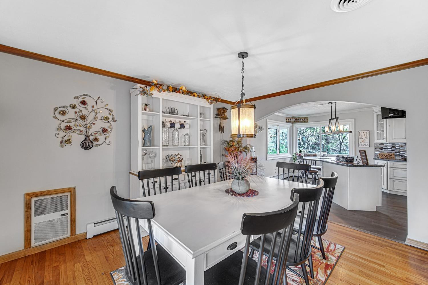 42 Ogden Road Portage, IN 46368 - Photo 16 of 40 a view of a dining room with furniture window and wooden floor