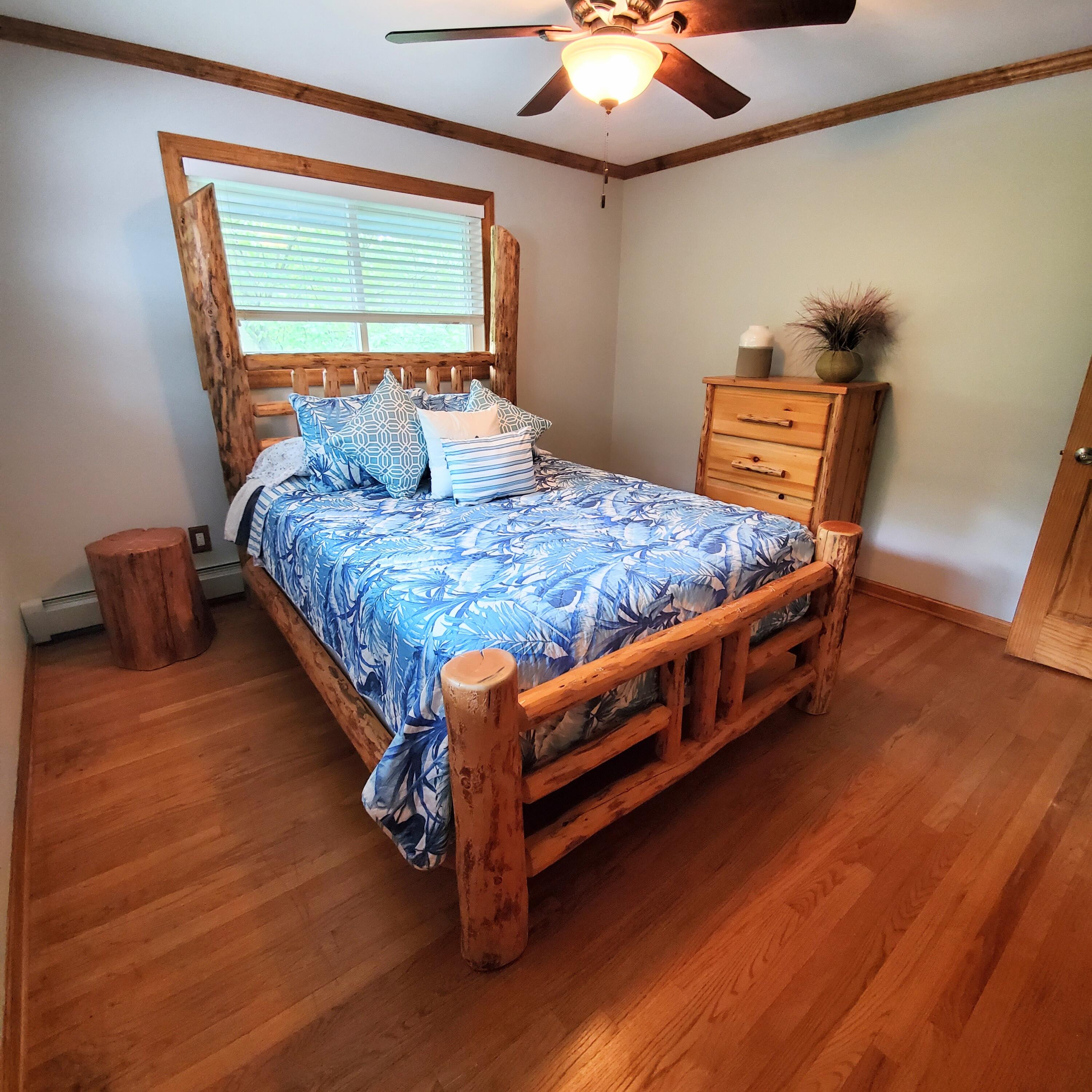 42 Ogden Road Portage, IN 46368 - Photo 28 of 40 a bed sitting in a bedroom next to a window