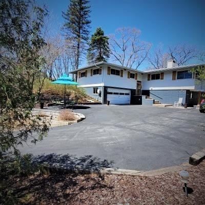 42 Ogden Road Portage, IN 46368 - Photo 36 of 40 a view of a house with a snow in the yard