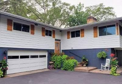 42 Ogden Road Portage, IN 46368 - Photo 37 of 40 a front view of a house with a garage