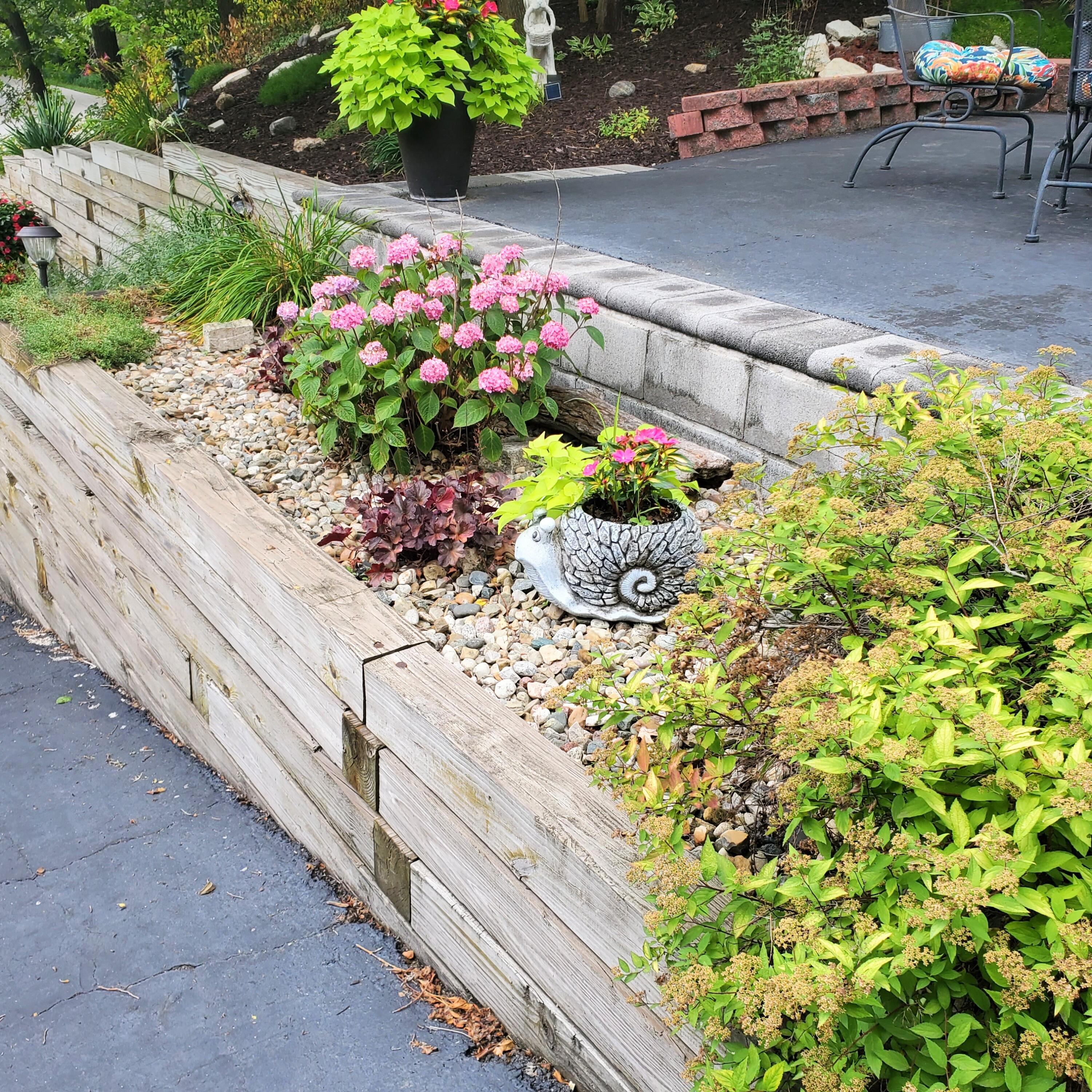 42 Ogden Road Portage, IN 46368 - Photo 39 of 40 a view of a garden with flowers and flowers