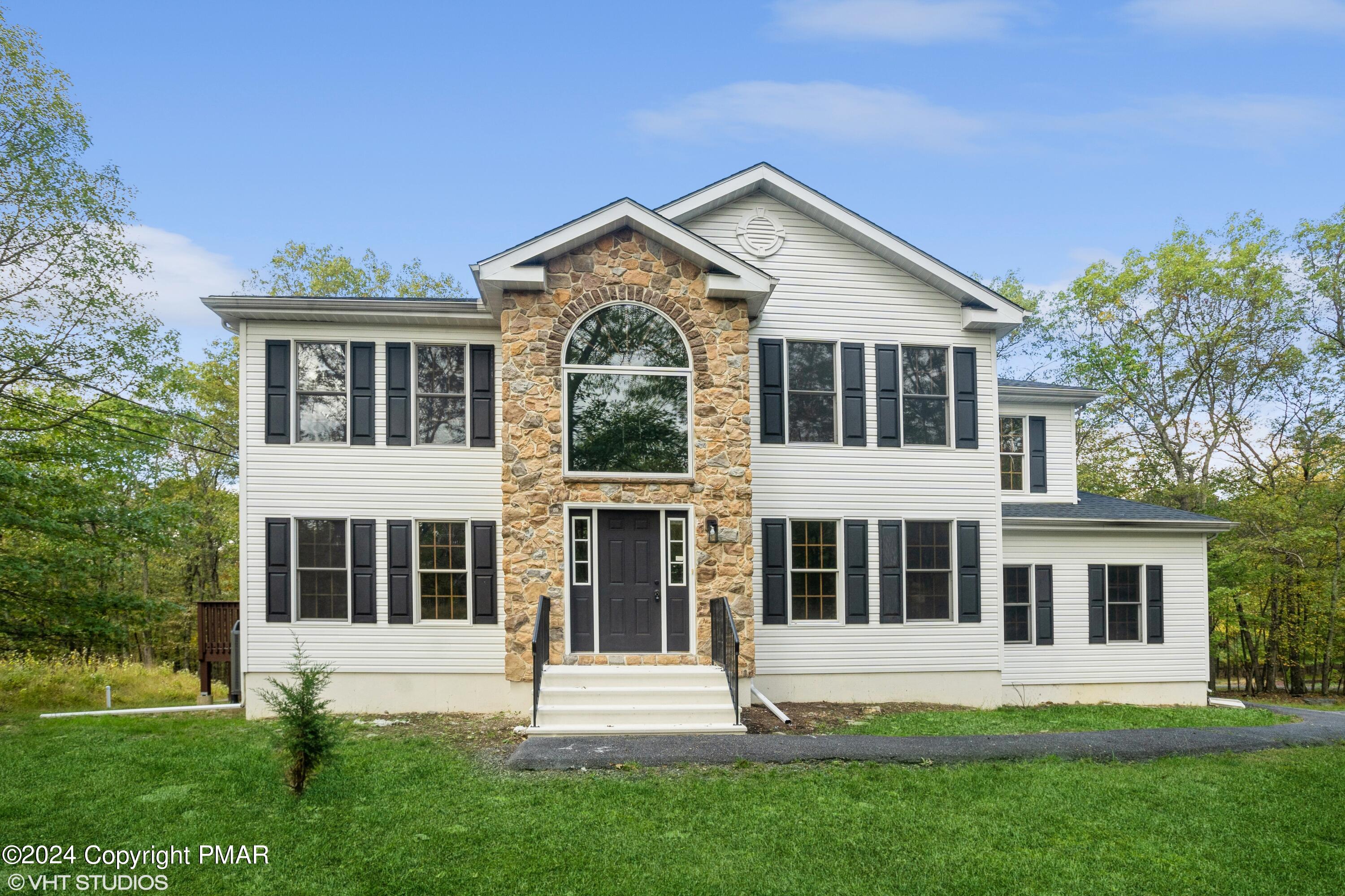 2196 Cardinal Drive Bushkill, PA 18324 - Photo 1 of 15 02_2196CardinalDr_300_FrontView_HiRes