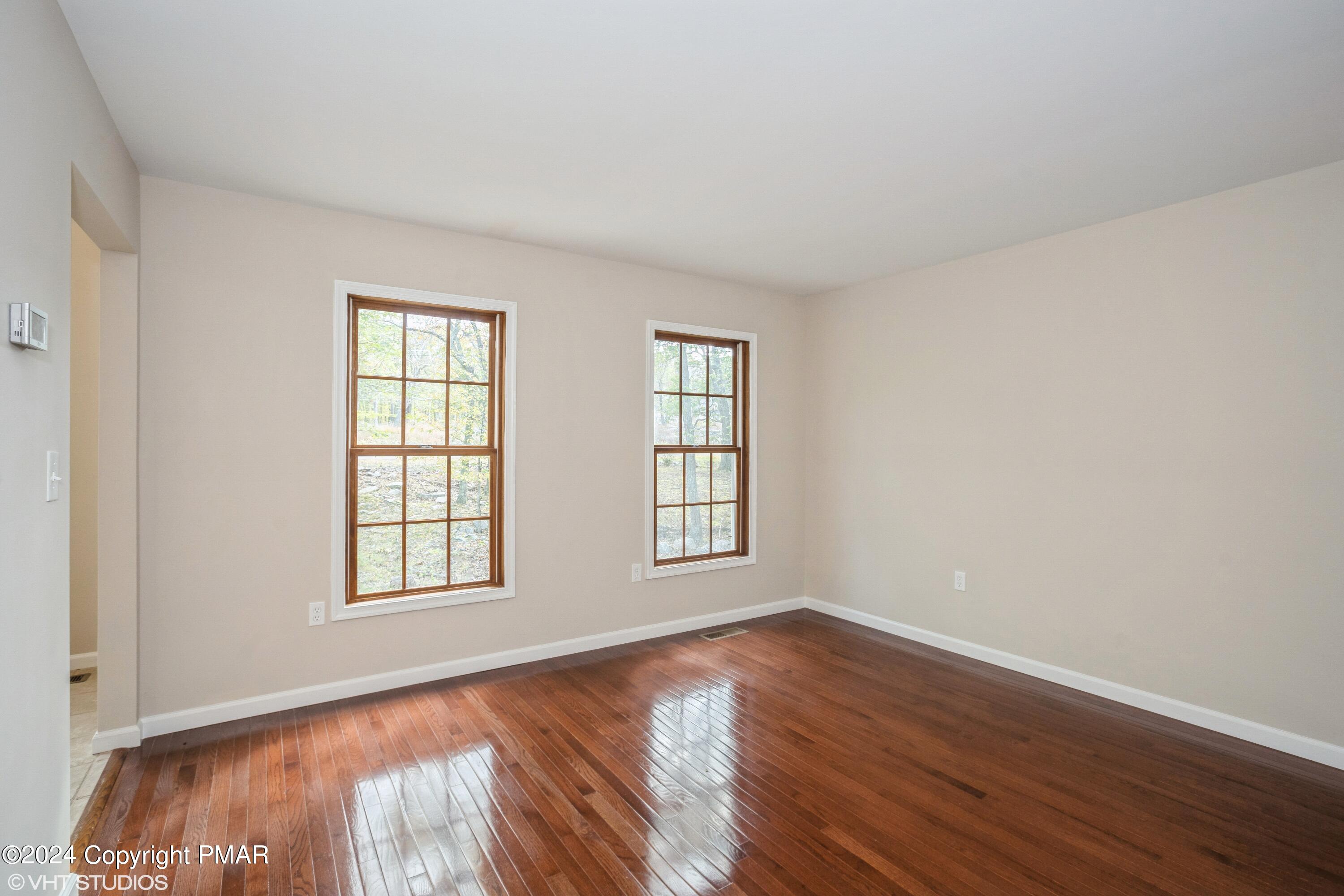 2196 Cardinal Drive Bushkill, PA 18324 - Photo 4 of 15 03_2196CardinalDr_165_LivingRoom_HiRes