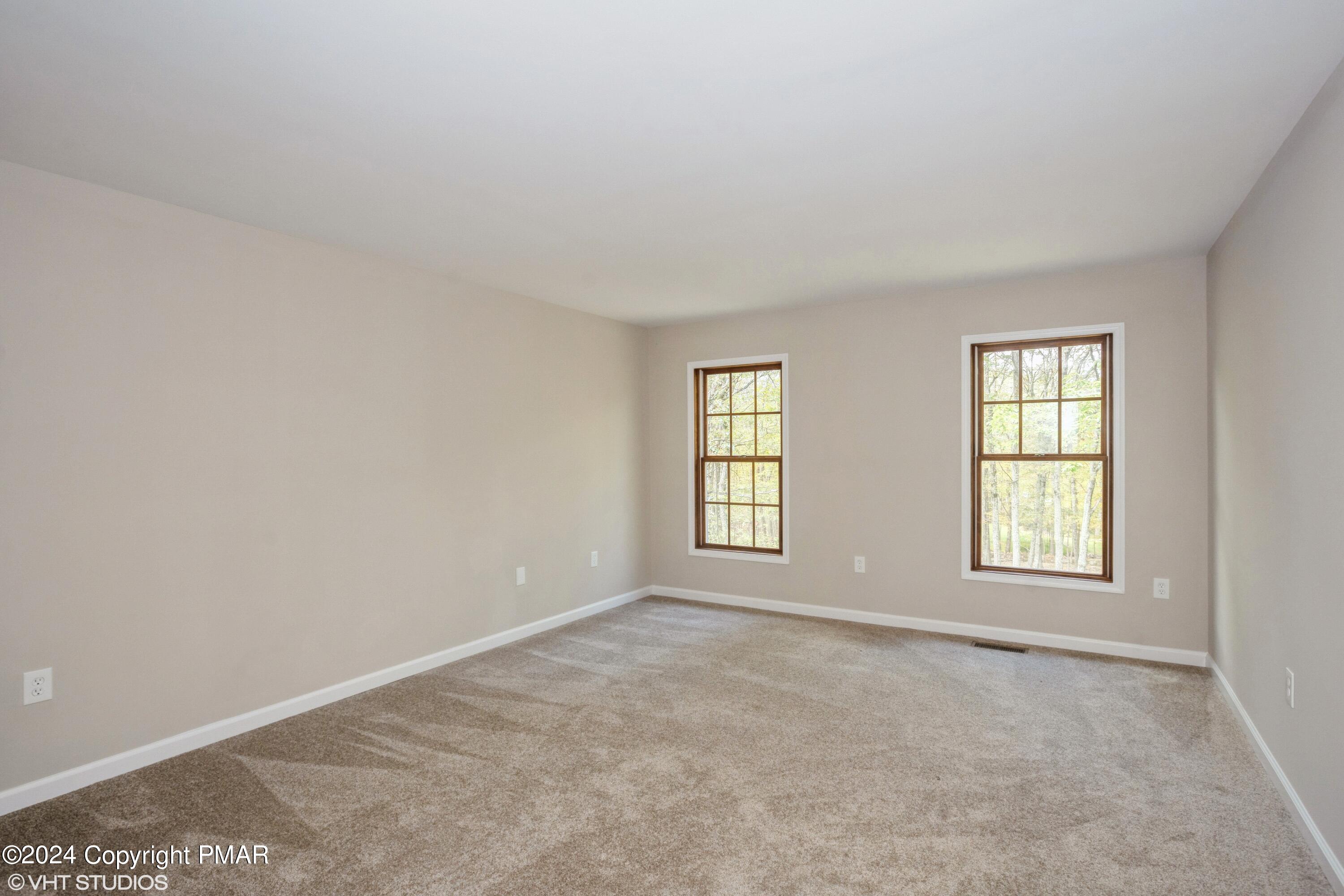 2196 Cardinal Drive Bushkill, PA 18324 - Photo 9 of 15 08_2196CardinalDr_14_PrimaryBedroom_HiRe