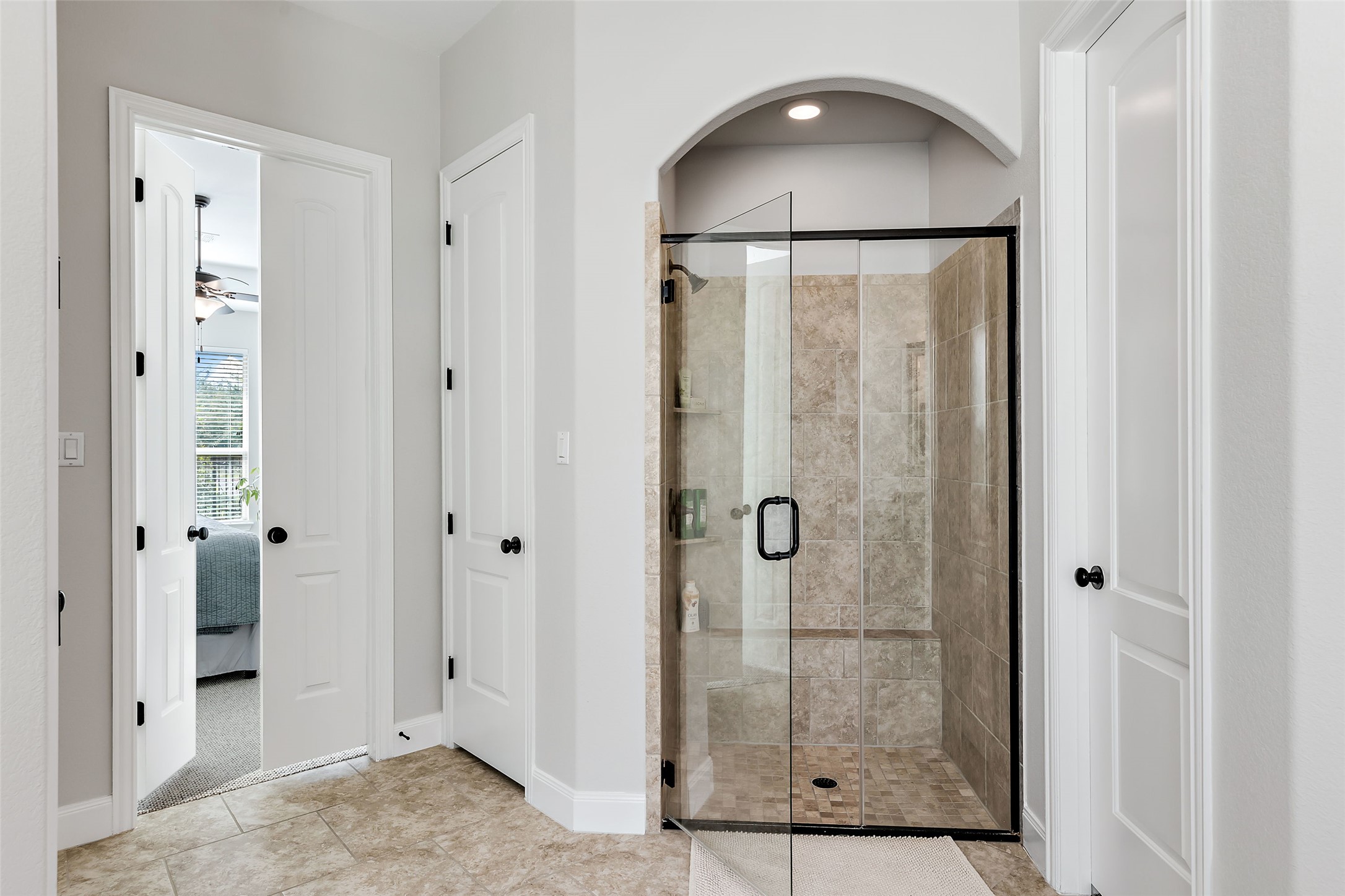 106 Maxwell Way, Unit 33 Austin, TX 78738 - Photo 16 of 40 Walk-in shower in primary bathroom