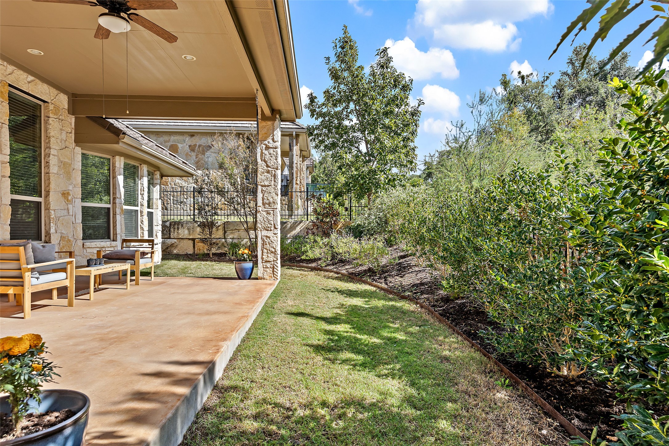 106 Maxwell Way, Unit 33 Austin, TX 78738 - Photo 24 of 40 Private backyard with trees