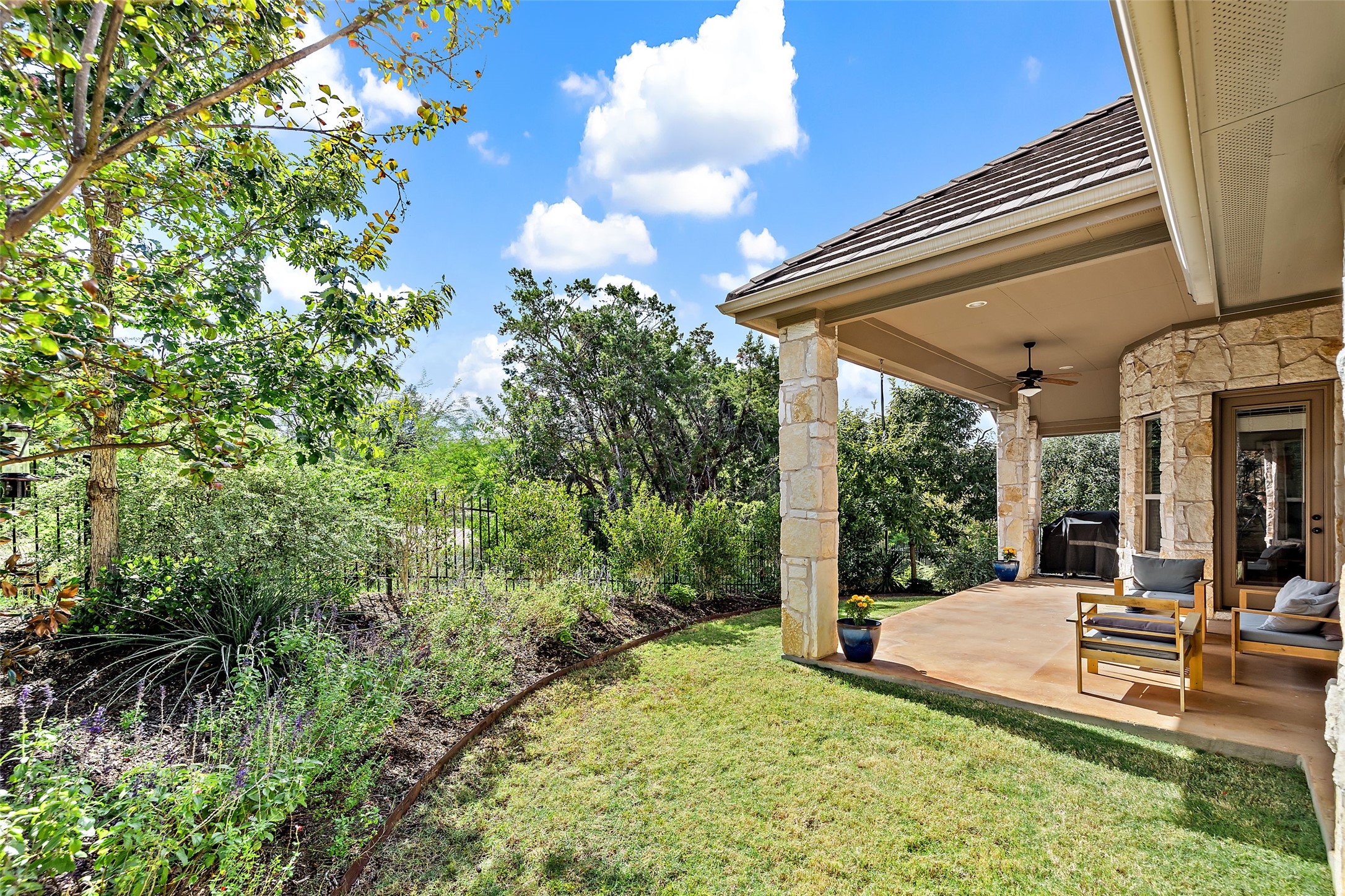 106 Maxwell Way, Unit 33 Austin, TX 78738 - Photo 25 of 40 View of side yard