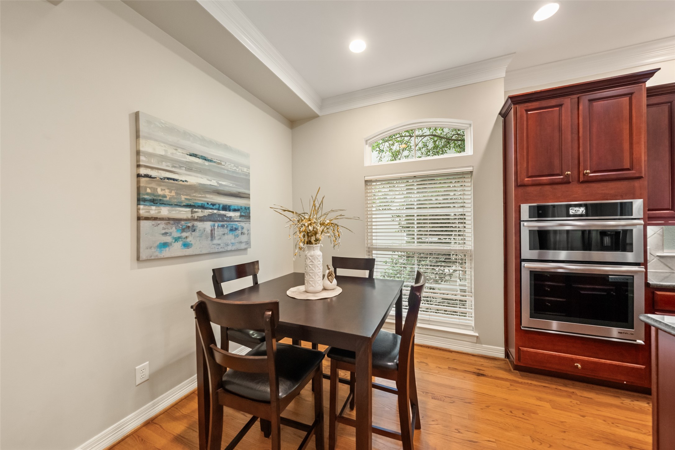 2708 Wroxton Road West University Place, TX 77005 - Photo 14 of 22 Enjoy breakfast with serene views of lush greenery through these inviting windows.