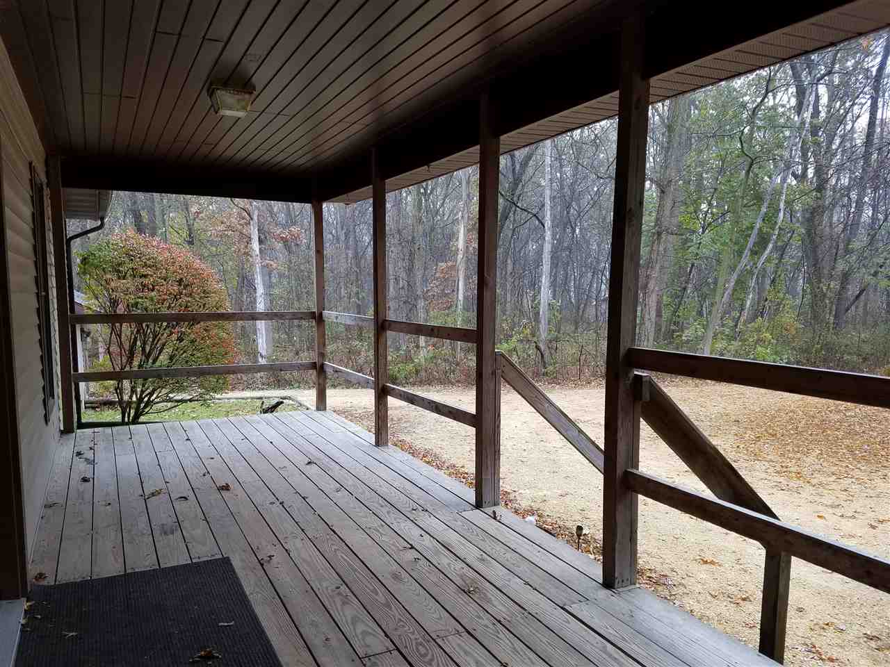 3224 South Seldom Scene Road Oregon, IL 61061 - Photo 12 of 17 a view of deck with wooden floor