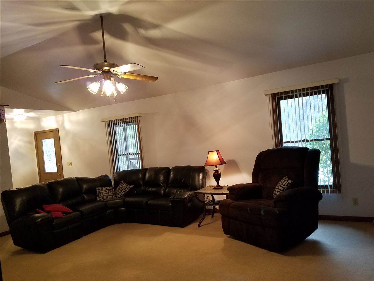 3224 South Seldom Scene Road Oregon, IL 61061 - Photo 2 of 17 a living room with furniture rug and a window