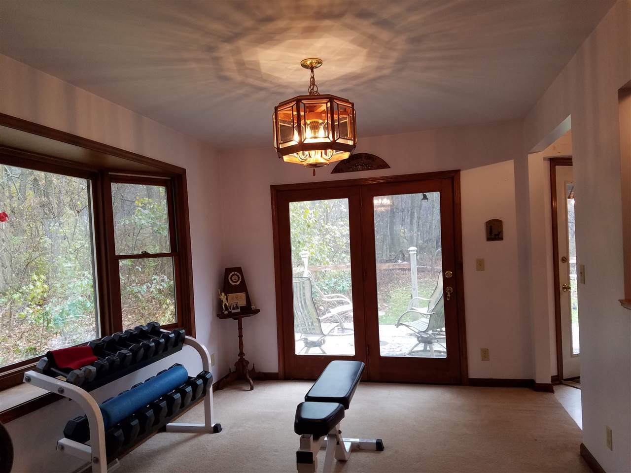 3224 South Seldom Scene Road Oregon, IL 61061 - Photo 7 of 17 a living room with furniture and a large window