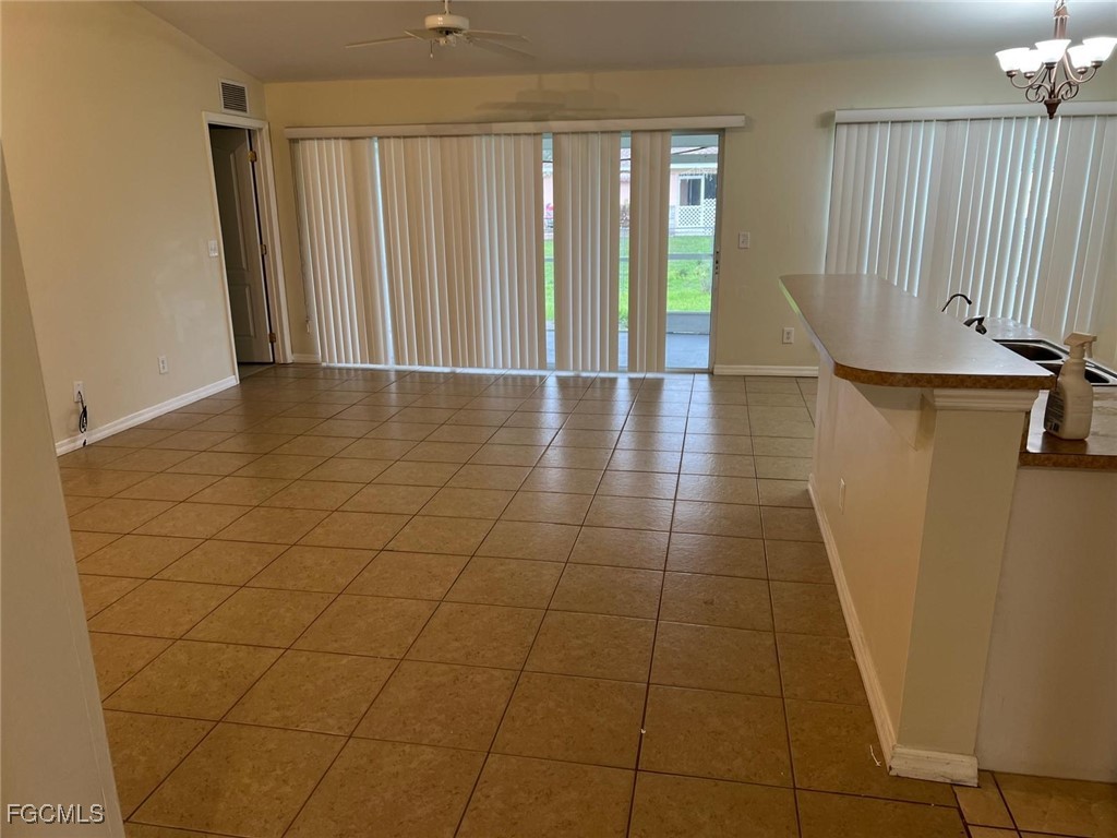 2923 3rd Street Southwest Lehigh Acres, FL 33976 - Photo 5 of 19 a view of a livingroom with a patio