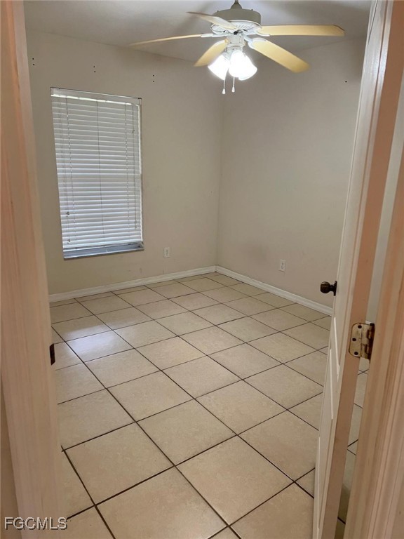 2923 3rd Street Southwest Lehigh Acres, FL 33976 - Photo 7 of 19 a view of an empty room with a window