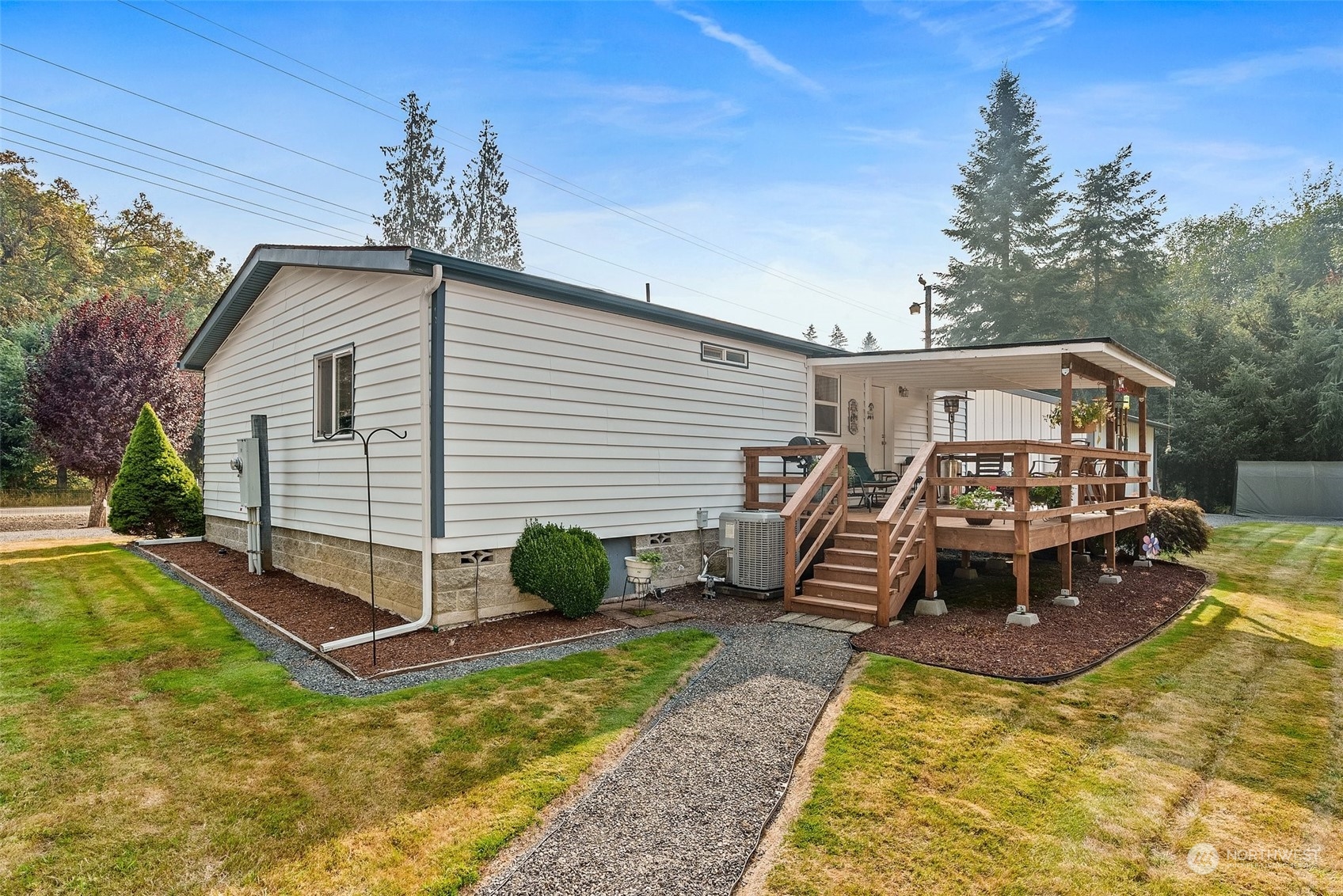 824 Winlock-Vader Road Winlock, WA 98596 - Photo 27 of 36 a view of a house with a patio