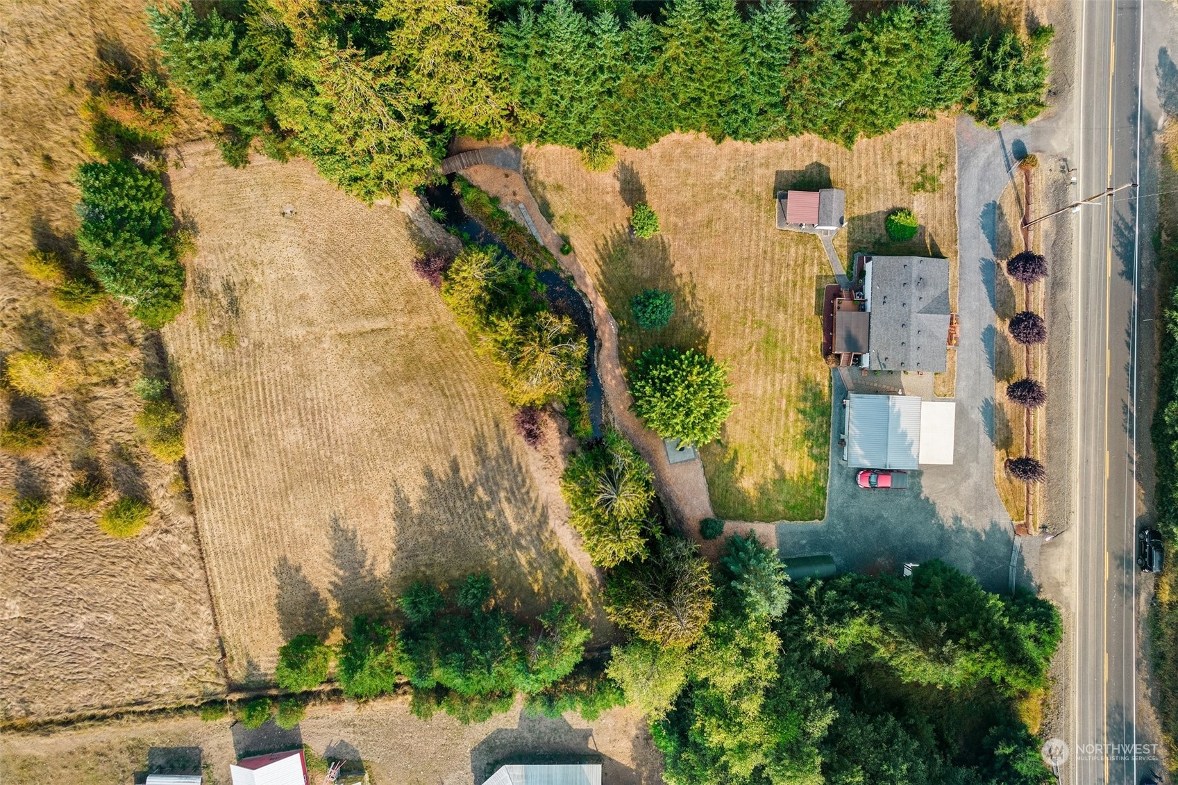 824 Winlock-Vader Road Winlock, WA 98596 - Photo 7 of 36 an aerial view of residential houses with outdoor space