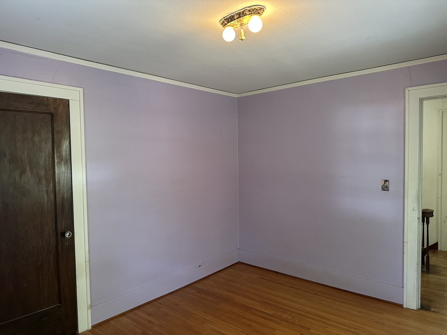 1418 North Sheridan Road Peoria, IL 61606 - Photo 22 of 34 a view of a hallway with wooden floor